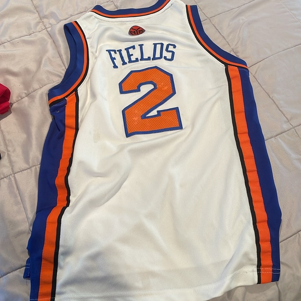 White Basketball Jersey with Blue and Orange Accents NY Knicks